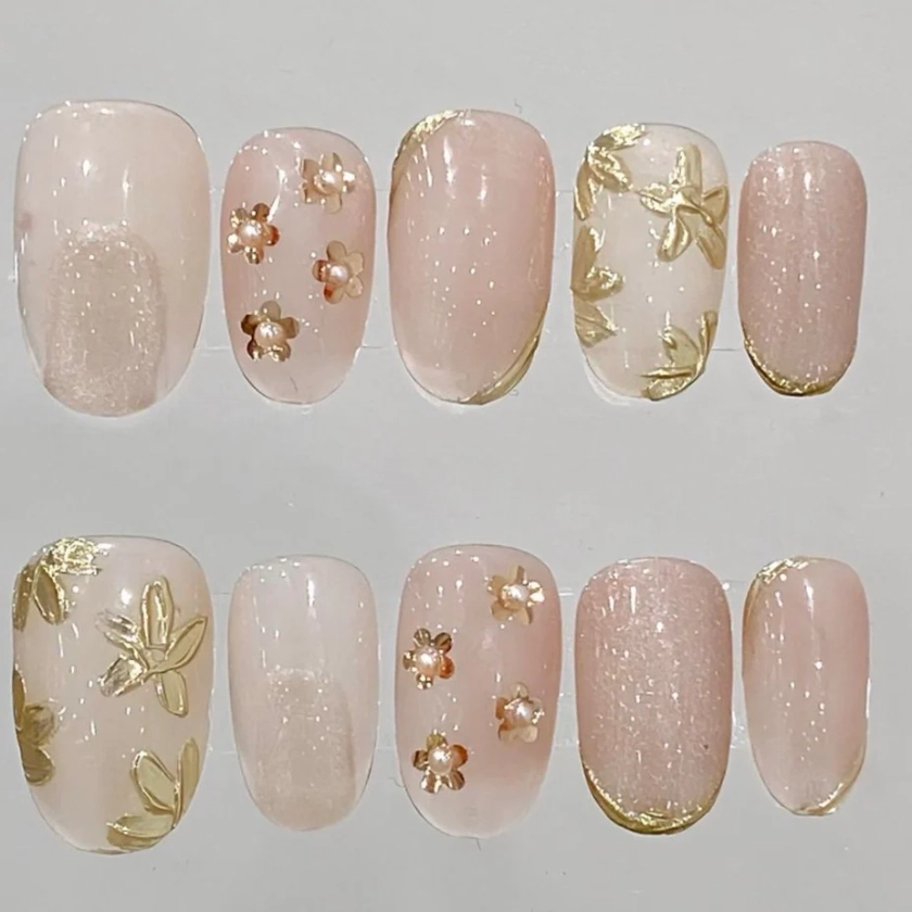 Elegant Glitter Press-On Nails with Floral and Gold Foil Accents