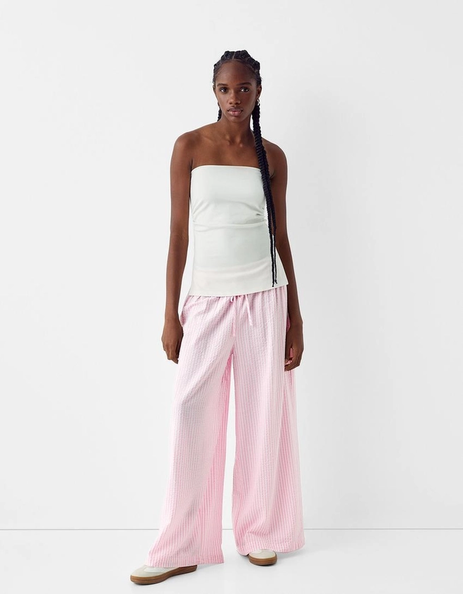Striped wide-leg creased-effect trousers