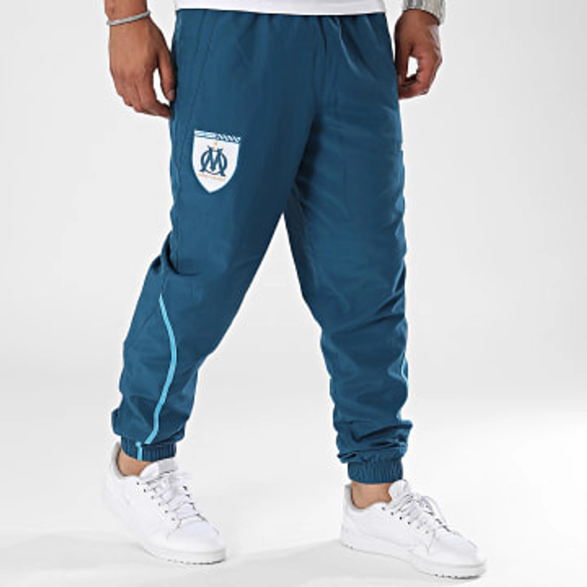 Puma - Pantalon Jogging OM Prematch Woven 778244 Bleu Canard - LaBoutiqueOfficielle.com