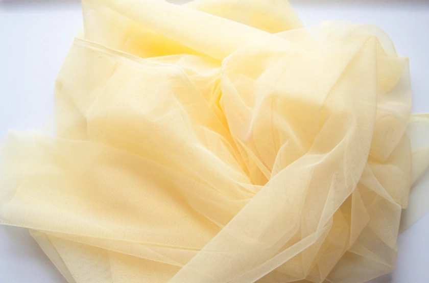pale yellow fabric, yellow stretch mesh fabric, light yellow tulle, yellow dress fabric, soft yellow wedding décor, spring yellow fabrics