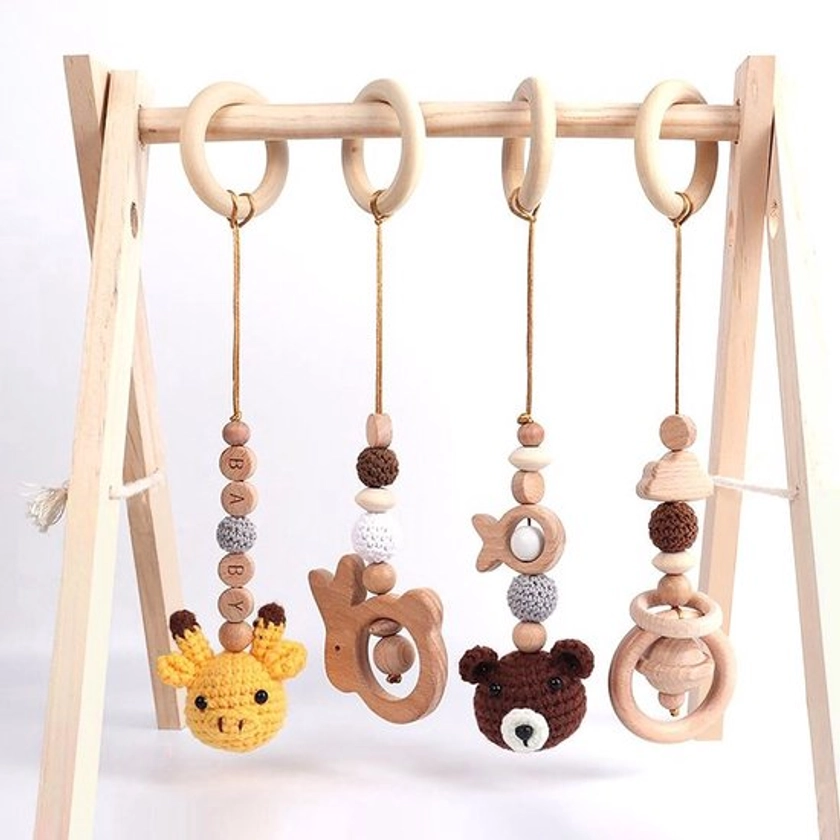 Babygym - inclusief vier speeltjes - Babygym hout - kraamcadeau jongen en meisje -... | bol