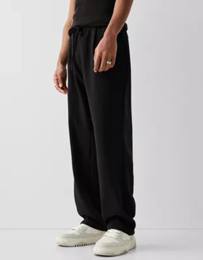 Bershka wide leg tailored trouser in black | ASOS