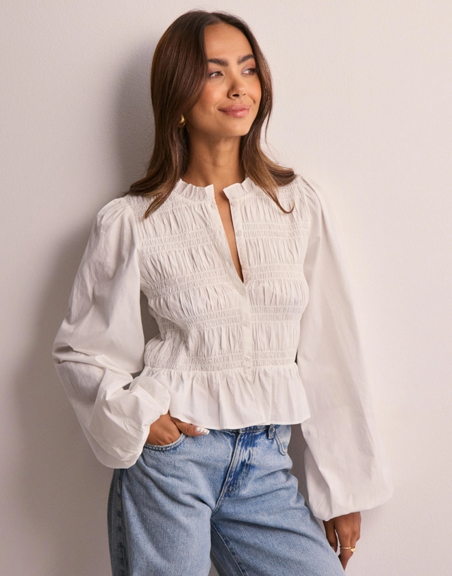 Kjøp Nelly Flirty Smock Blouse - White | Nelly.com