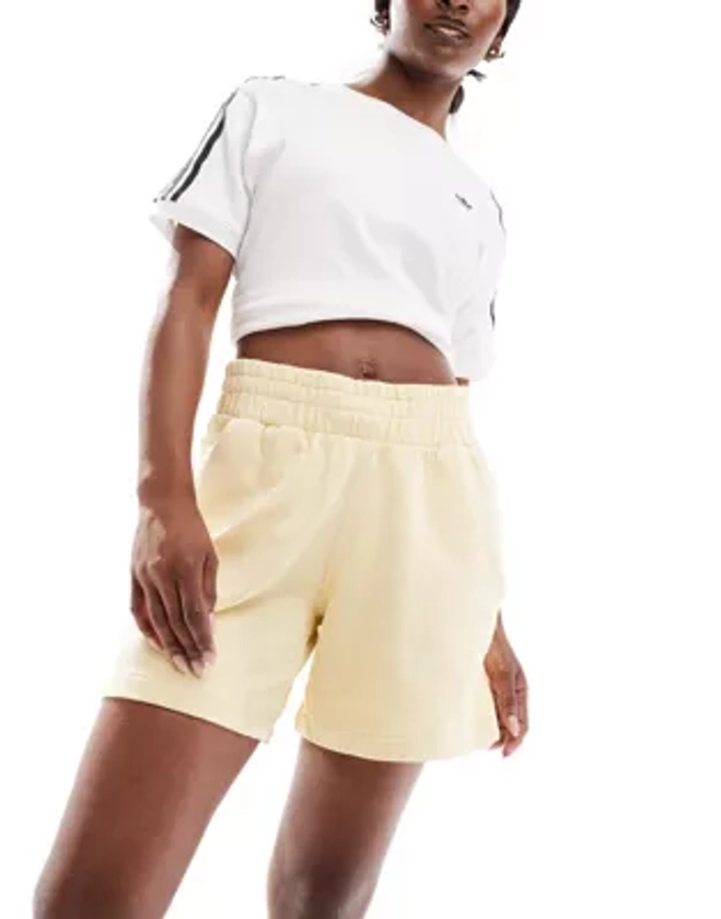 adidas Originals essentials jersey shorts in pale yellow | ASOS