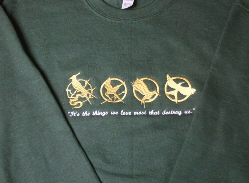 Sweat-shirt ras du cou brodé Mockingjay Evolution inspiré de Hunger Games