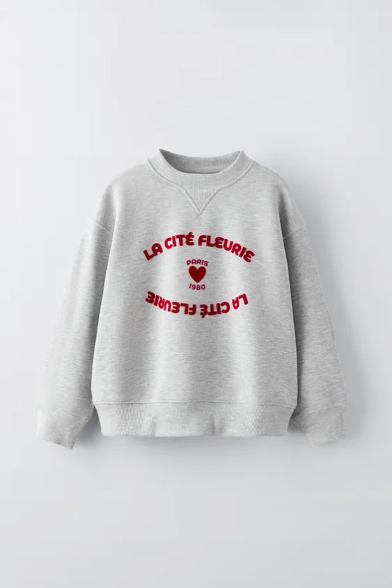 SWEAT INSCRIPTION FLOCKÉE