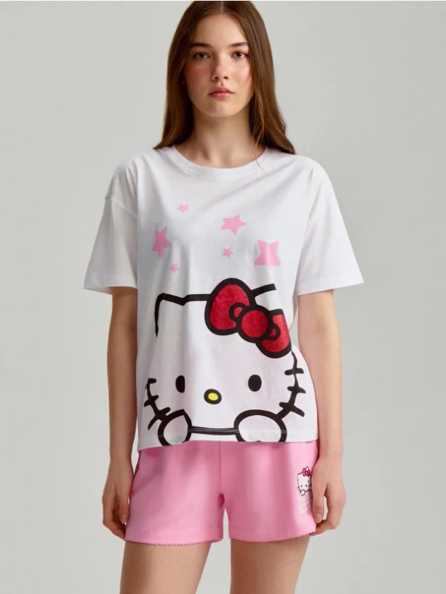 Biało-różowa dwuczęściowa piżama z motywem Hello Kitty