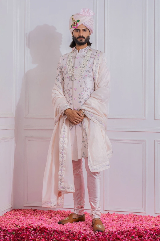 Buy Pink Raw Silk Embroidered Floral Sherwani Set For Men by Ankit V Kapoor Online at Aza Fashions.