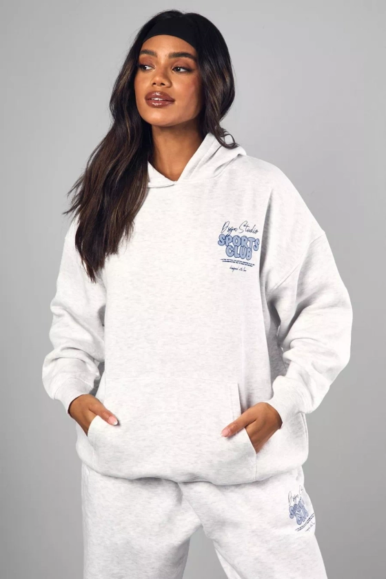 Sweat à capuche oversize à slogan