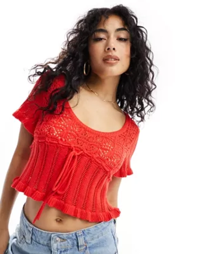 ASOS DESIGN knitted milkmaid top in open stitch with tie waist in red | ASOS
