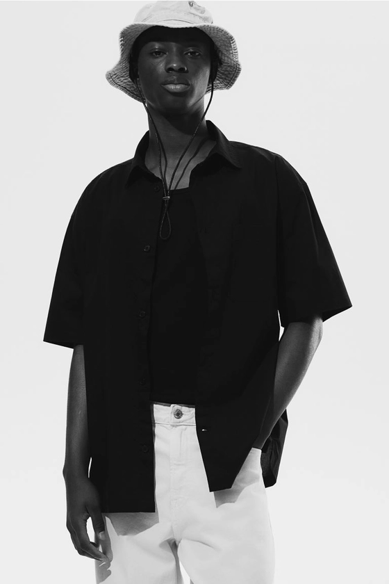 Chemise Relaxed Fit à manches courtes - Noir - HOMME | H&M FR