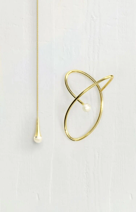 Gold ear-cuff and chain with pearl