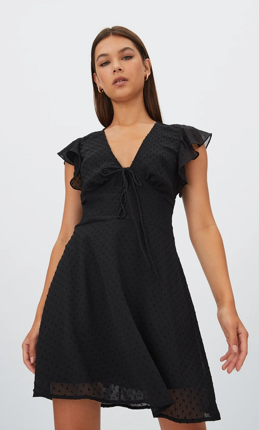 Robe courte en tulle avec relief - Robes femme | Stradivarius France