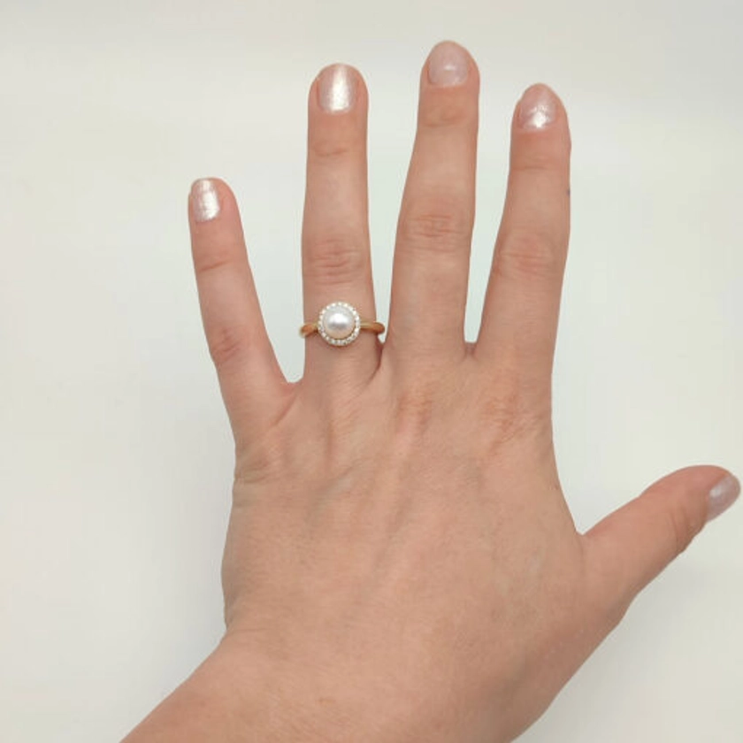 Δαχτυλίδι ροζέτα χρυσό με μαργαριτάρι και ζιργκόν Κ14 – RNG1315