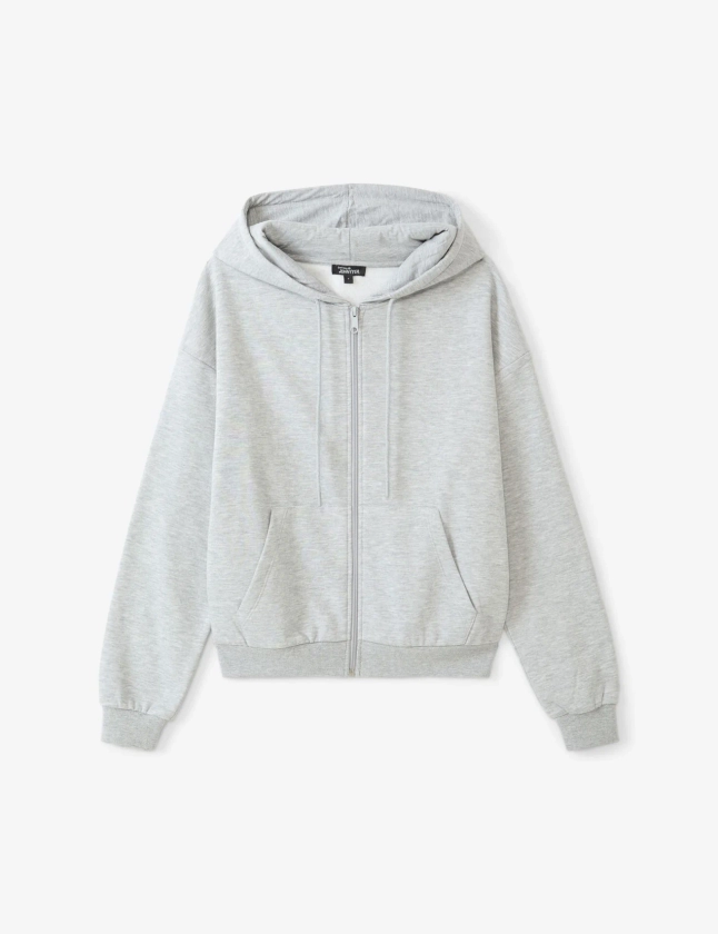 Sweat zippé gris chné