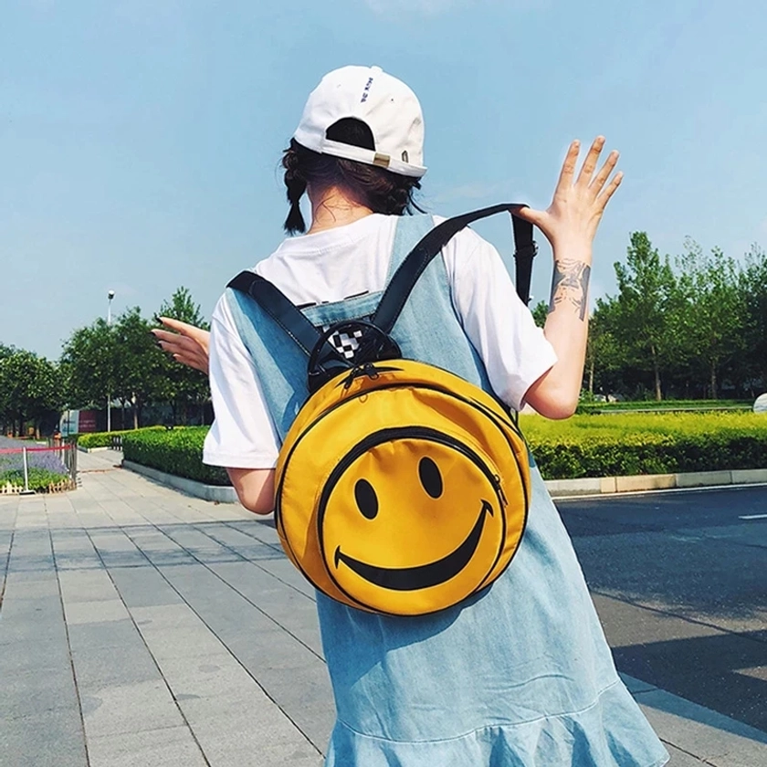 Sac à dos de voyage jaune en nylon pour femmes et enfants, avec visage souriant drôle, grande capacité, imprimé de dessin animé, pour étudiants