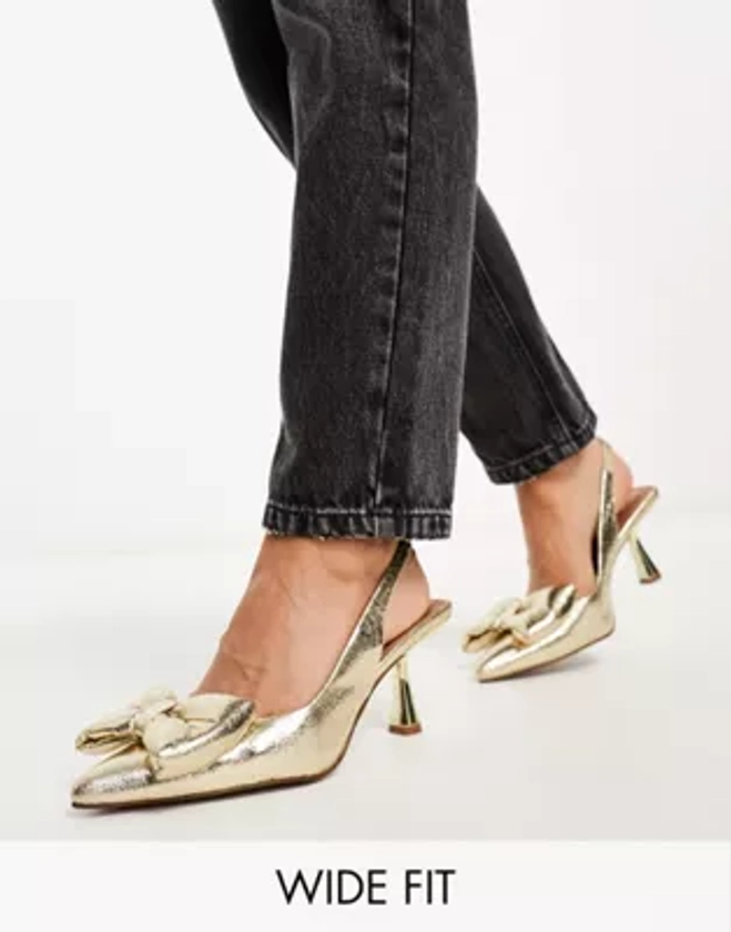 ASOS DESIGN Wide Fit Scarlett bow detail mid heeled shoes in gold | ASOS