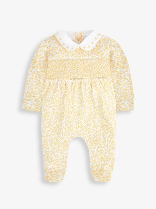 Buy Yellow Floral Smocked Cotton Baby Sleepsuit from the JoJo Maman Bébé UK online shop